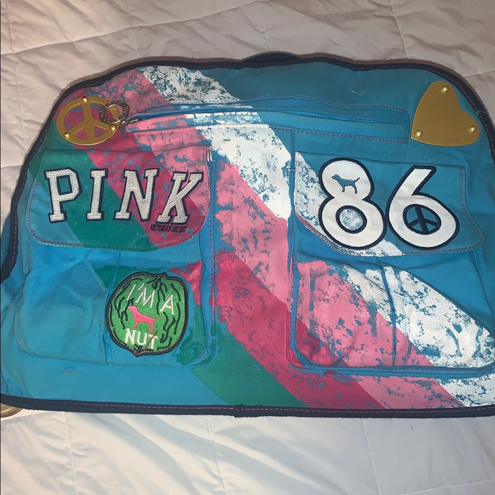 VS Pink Rolling Suitcase w/Toiletry Bag